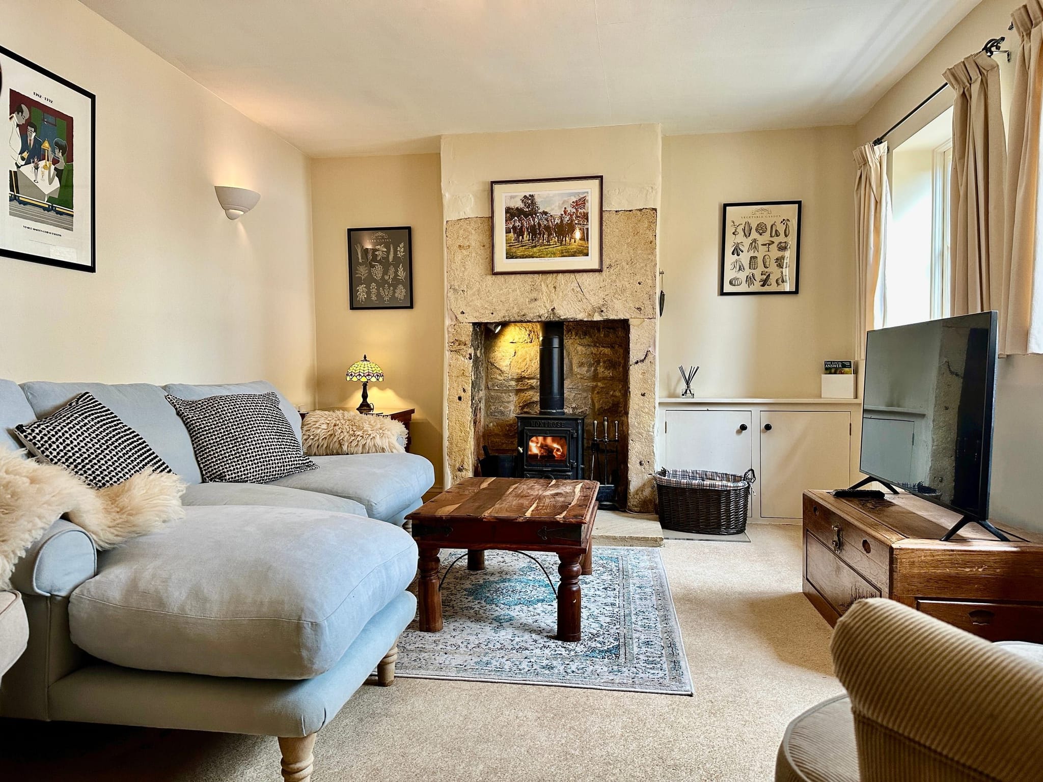 Camside living room with wood burner